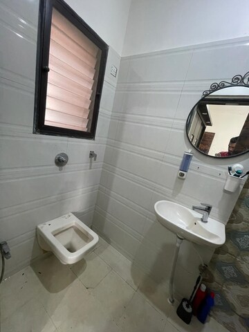 Bathroom in 2 BHK Apartment at Riverdale Tower, Andheri East – for Sale