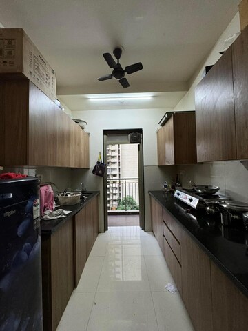 Kitchen in 2 BHK Apartment at Lodha Splendora, Ghodbunder Road – for Sale