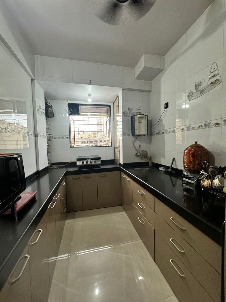 Kitchen, thakur-kedarnath-tower 3 Bedroom 950 Sq.Ft. Apartment In Versova Mumbai 7698373