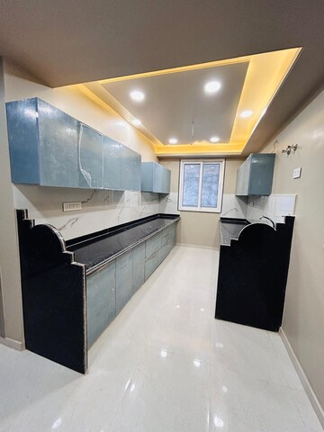 Kitchen in 4 BHK Apartment at Mansarovar – for Sale