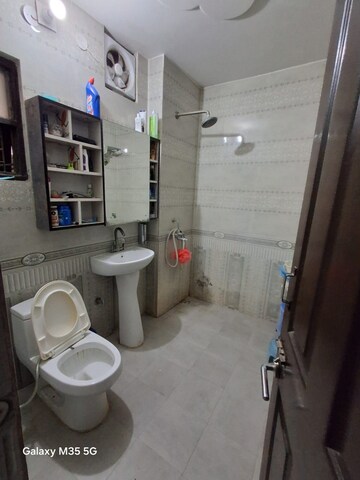 Bathroom in 2 BHK Apartment at Sangwan Heights, Raj Nagar Extension – for Sale