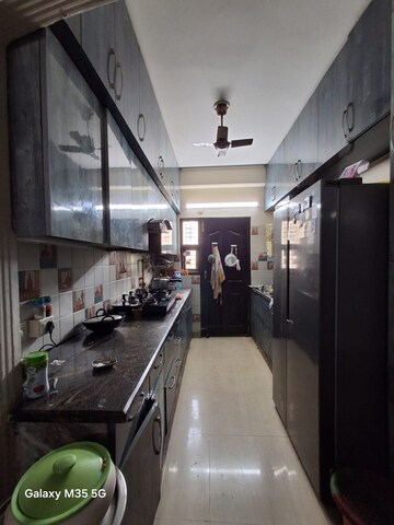 Kitchen in 2 BHK Apartment at Sangwan Heights, Raj Nagar Extension – for Sale