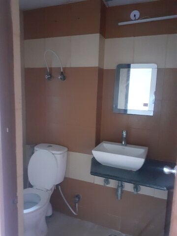 Bathroom in 3 BHK Apartment at Mahagun Mywoods, Sector 16c Greater Noida – for Sale