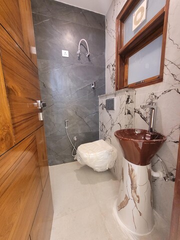 Bathroom in 5 BHK Builder Floor at Palam Vihar – for Sale