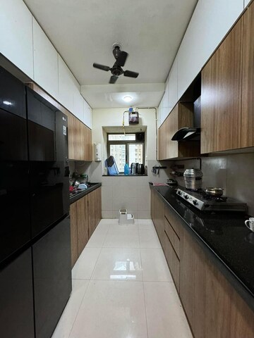 Kitchen in 3 BHK Apartment at Lodha Splendora, Ghodbunder Road – for Sale