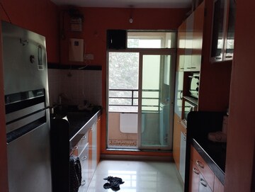 Kitchen in 2 BHK Apartment at Mahavir Kalpavruksha, Ghodbunder Road – for Sale