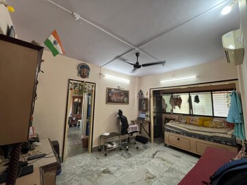 Living Room in 1 RK Apartment at Jai Laxminarayan CHS, Mulund East – for Sale