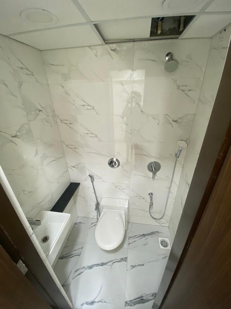 Bathroom, hubtown-harmony-b-wing 2 Bedroom 599 Sq.Ft. Apartment In Matunga Mumbai 7700510