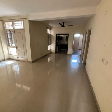 Living Room in 2 BHK Apartment at Dhakoli Village – for Sale