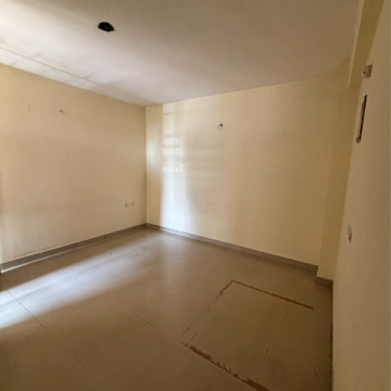 Bedroom in 2 BHK Apartment at Dhakoli Village – for Sale