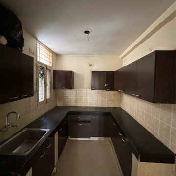 Kitchen in 2 BHK Apartment at Dhakoli Village – for Sale