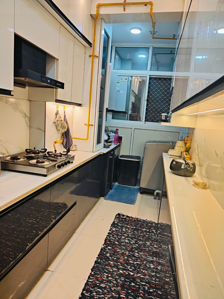 Kitchen, uninav-utopia 4 Bedroom 2650 Sq.Ft. Apartment In Morti Ghaziabad 7701576