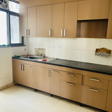 Kitchen in 2 BHK Apartment at Unitech Uniworld Resorts-The Residences, Islampur – for Sale