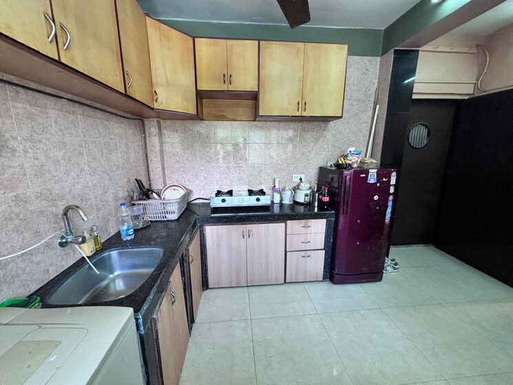 Kitchen, queens-park-apartments 1 Bedroom 610 Sq.Ft. Apartment In Juhu Mumbai 7703859