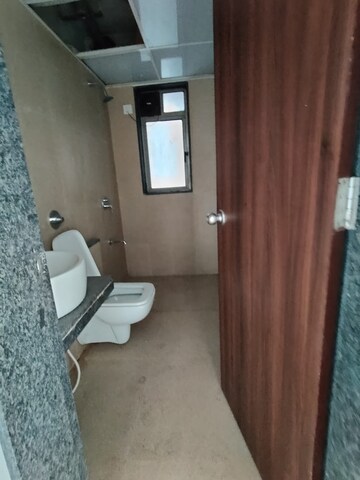 Bathroom in 2 BHK Apartment at Runwal Eirene, Balkum Pada – for Rent