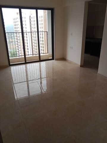 Living Room in 1 BHK Apartment at Sunteck Maxxworld, Naigaon East – for Sale