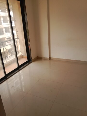 Bedroom in 1 BHK Apartment at Mahalaxmi Nagar, Naigaon East – for Sale