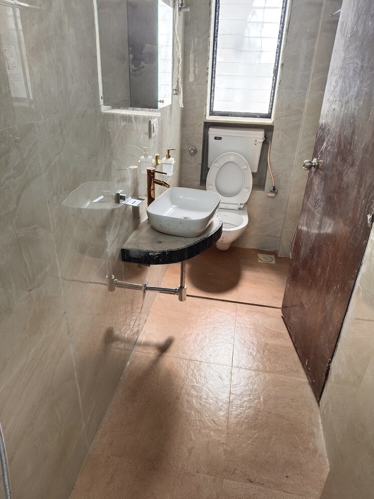 Bathroom, dosti-flamingos 2 Bedroom 976 Sq.Ft. Apartment In Parel Mumbai 7705579