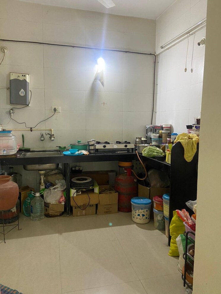 Kitchen, nirman-viva-phase-ii 2 Bedroom 1001 Sq.Ft. Apartment In Ambegaon Budruk Pune 7706198