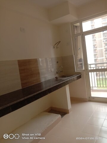 Kitchen in 2 BHK Apartment at Shree Vardhman Flora, Sector 90 – for Sale