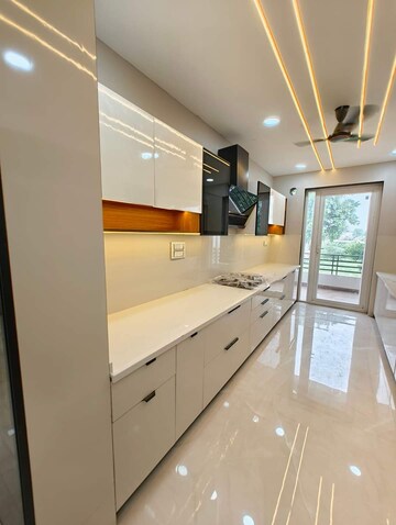 Kitchen in 4 BHK Builder Floor at Puri Aman Vilas, Sector 89 – for Sale