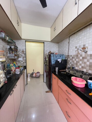 Kitchen in 2 BHK Apartment at Saaga Mrunali CHS, Borivali East – for Sale