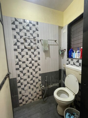 Bathroom in 2 BHK Apartment at Saaga Mrunali CHS, Borivali East – for Sale
