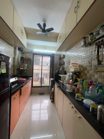 Kitchen in 2 BHK Apartment at Saaga Mrunali CHS, Borivali East – for Sale