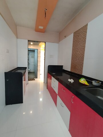 Kitchen in 2 BHK Apartment at Puranik Rumah Bali, Ghodbunder Road – for Sale
