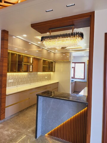 Kitchen in 4 BHK Builder Floor at Puri Aman Vilas, Sector 89 – for Sale