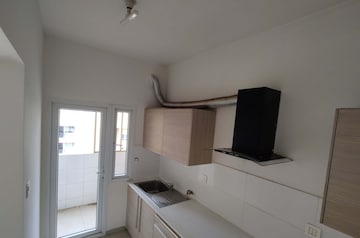 Kitchen in 2 BHK Apartment at Bhartiya Nikoo Homes, Thanisandra Main Road – for Sale