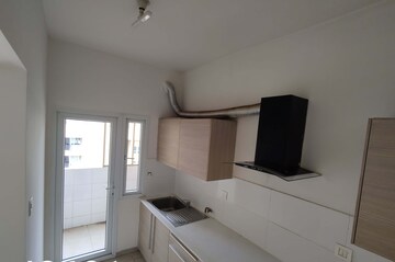 Kitchen in 2 BHK Apartment at Bhartiya Nikoo Homes, Thanisandra Main Road – for Sale