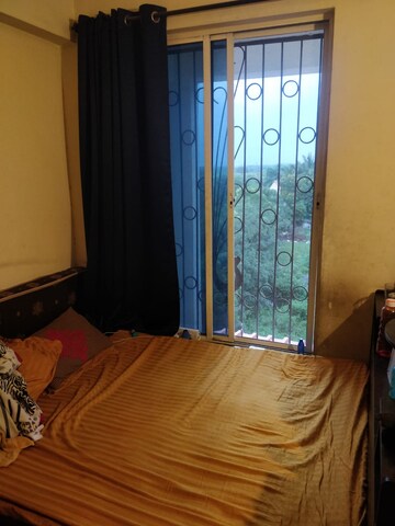 Bedroom in 2 BHK Apartment at Dhanori – for Rent