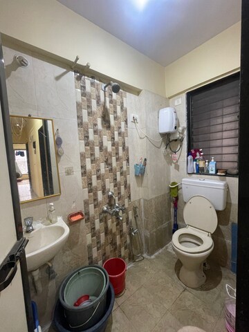 Bathroom in 1 BHK Apartment at MICL Aaradhya Highpark, Mira Road – for Sale