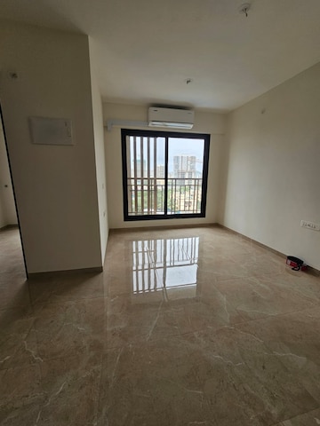 Living Room in 1 BHK Apartment at MICL Aaradhya Highpark, Mira Road – for Sale