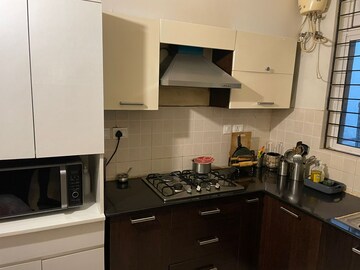 Kitchen in 3 BHK Builder Floor at Ansal API Esencia, Sector 67 – for Sale