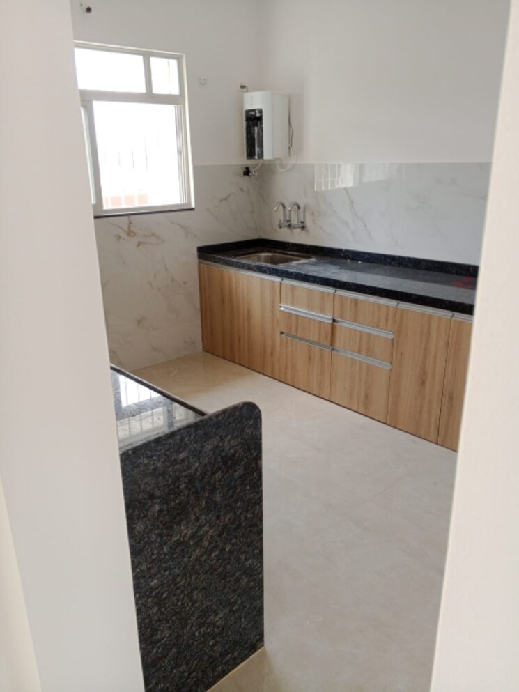 Kitchen, runal-spacio 2 Bedroom 950 Sq.Ft. Apartment In Ravet Pune 7713214