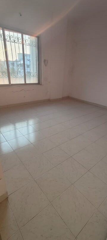 Room in 2 BHK Apartment at Channal Classic Apartment, Kopar Khairane – for Sale