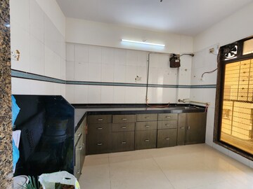 Kitchen in 2 BHK Apartment at Kopar Khairane – for Sale