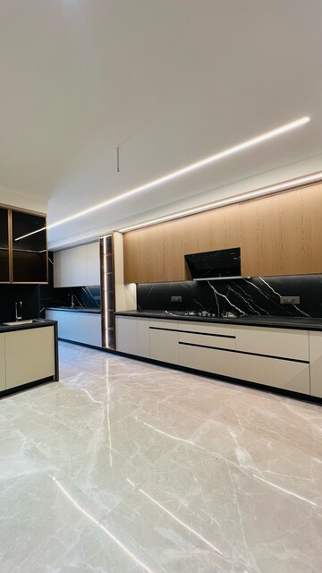 Kitchen in 4 BHK Builder Floor at Unitech Greenwood City Apartment, Sector 45 – for Sale