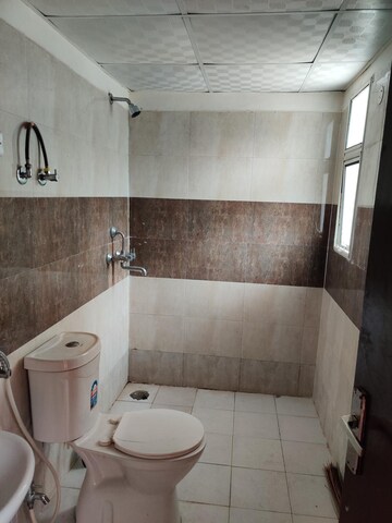 Bathroom in 2.5 BHK Apartment at Town Park White Orchid, Sector 16c Greater Noida – for Sale
