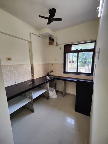 Kitchen in 1.5 BHK Apartment at Squarefeet Green Square, Ghodbunder Road – for Sale