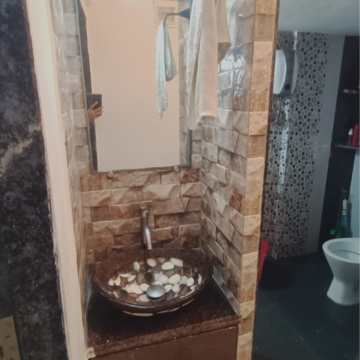 Bathroom in 1 BHK Apartment at Vasudev Sky High, Kanakia Road – for Sale