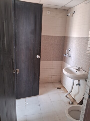 Bathroom in 3 BHK Apartment at Signature Global Orchard Avenue, Sector 93 – for Sale