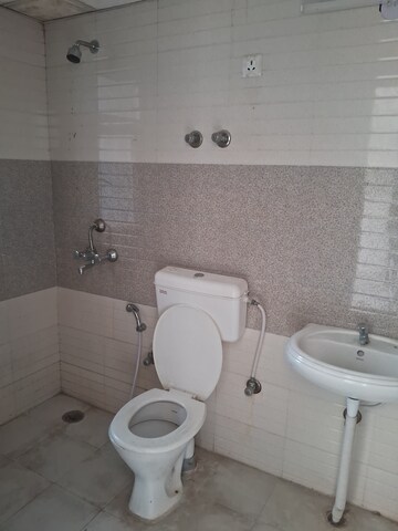 Bathroom in 3 BHK Apartment at Signature Global Orchard Avenue, Sector 93 – for Sale