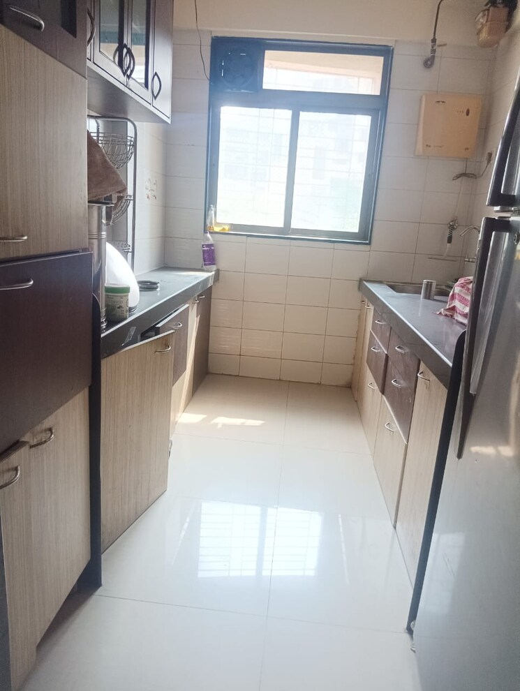 Kitchen, vasant-mandar-chs 2 Bedroom 722 Sq.Ft. Apartment In Vasant Vihar Thane 7715182