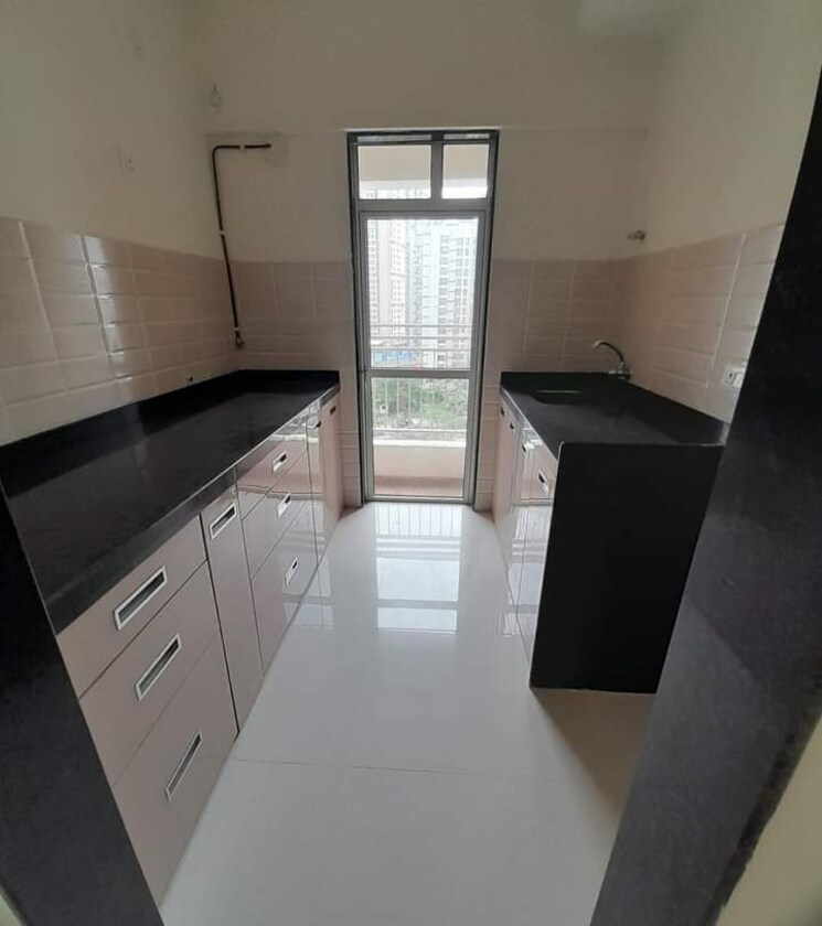 Kitchen, jp-north-barcelona 3 Bedroom 915 Sq.Ft. Apartment In Mira Road Thane 7715511