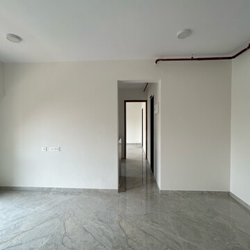 Living Room in 1 BHK Apartment at Ajmera Boulevard, Kanch Pada – for Sale
