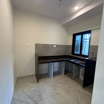 Kitchen in 2 BHK Apartment at Ajmera Boulevard, Kanch Pada – for Sale