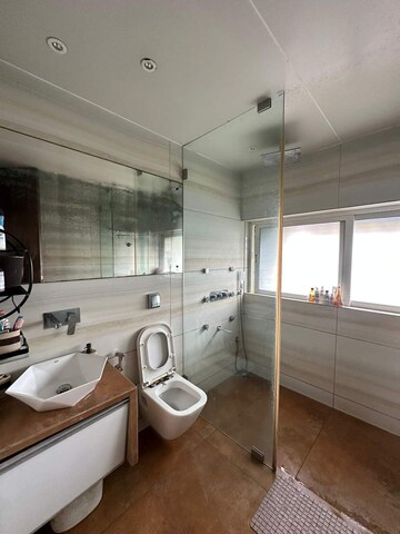 Bathroom in 3 BHK Apartment at Pranjee Garden City, Katrap – for Sale
